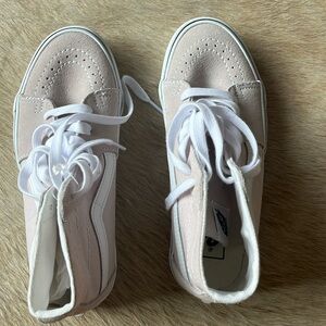 Women’s high top Vans sneakers